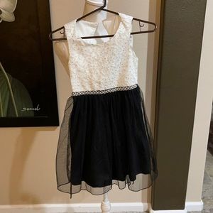 Elegant girls dress in white and black